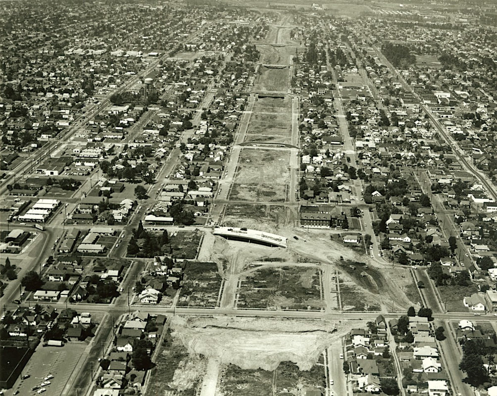 Aerial view of the construction of the I-5 Freeway (known then as the Minnesota Freeway) through NE Portland in 1963. City of Portland Archive Image A2004-001.1013.